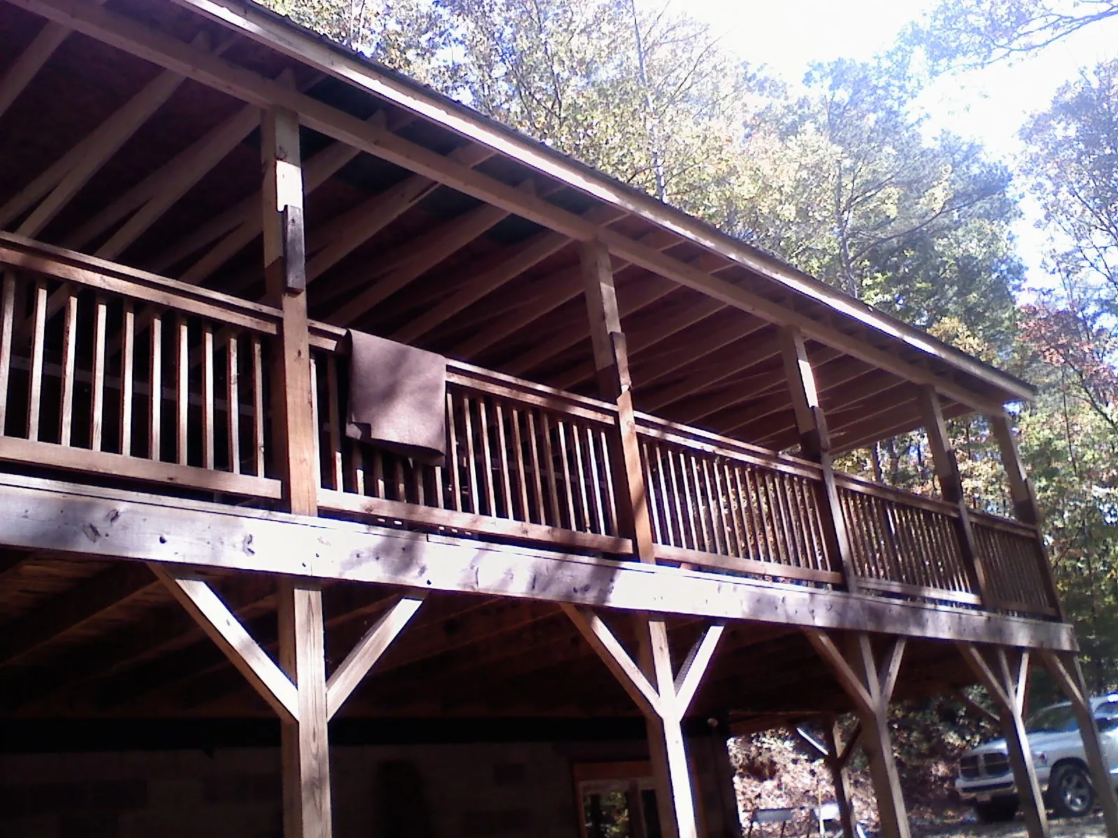 Timber framing under a new elevated porch and deck — Roof Leak Repair in Burr by Roofing Brothers